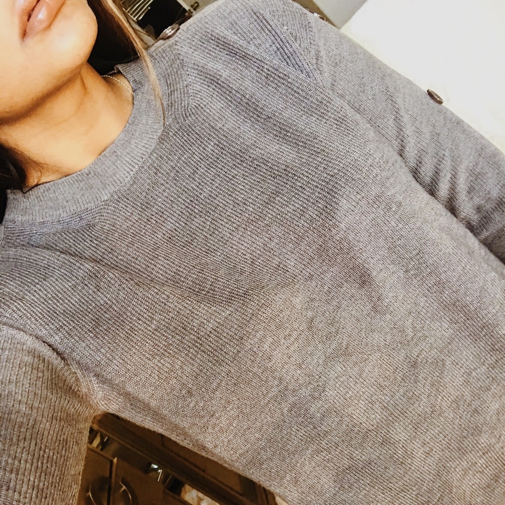 Button sleeve detailed sweater